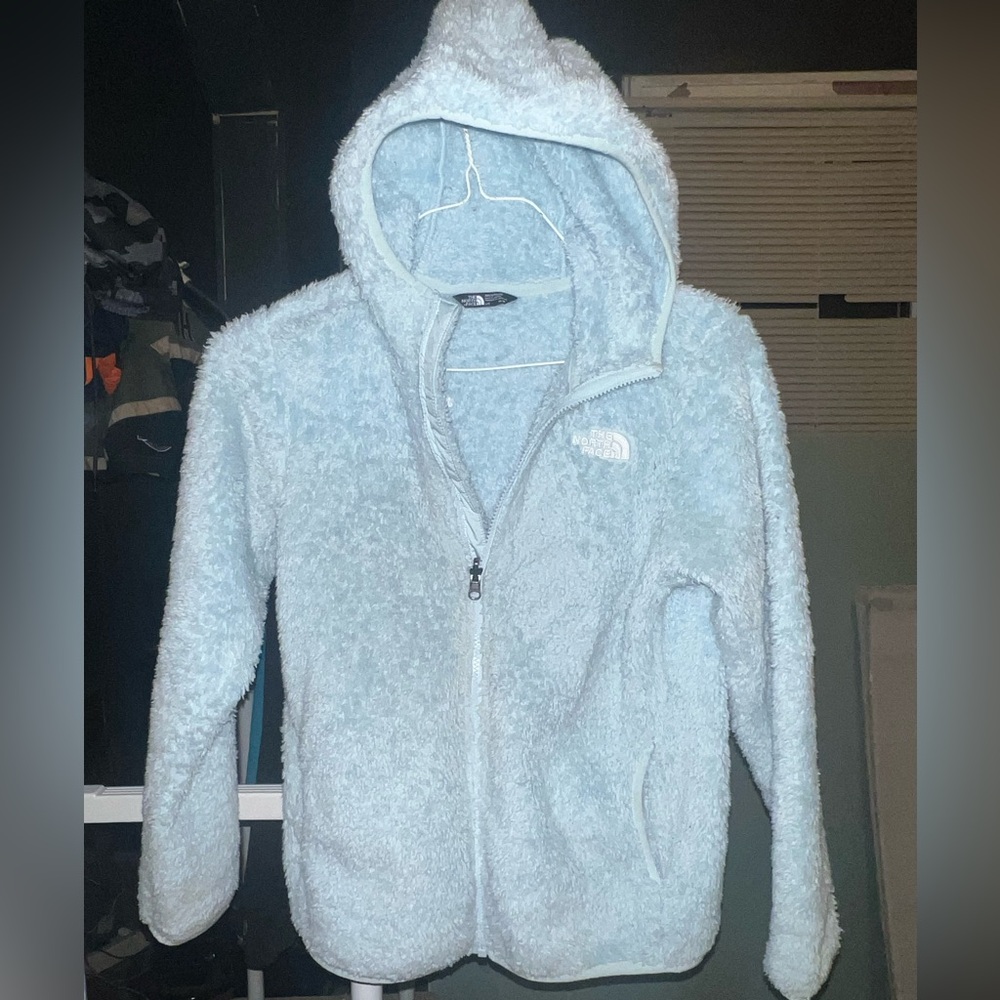 Girls NorthFace furry jacket. Girls size 14–16. Baby blue very soft